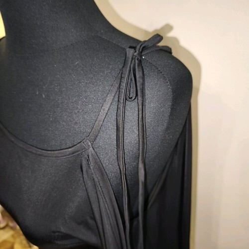 Black asymmetric top like new with ties and semi-transparent sleeves size M