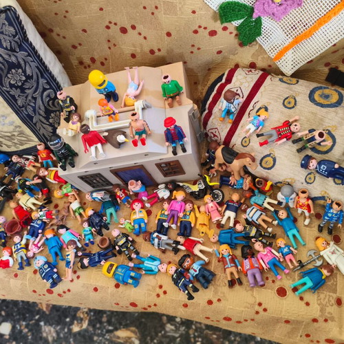 100 Playmobil figures with house set