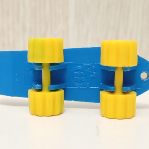 Vintage Algida Lucky Cup blue skateboard toy from the 1980s