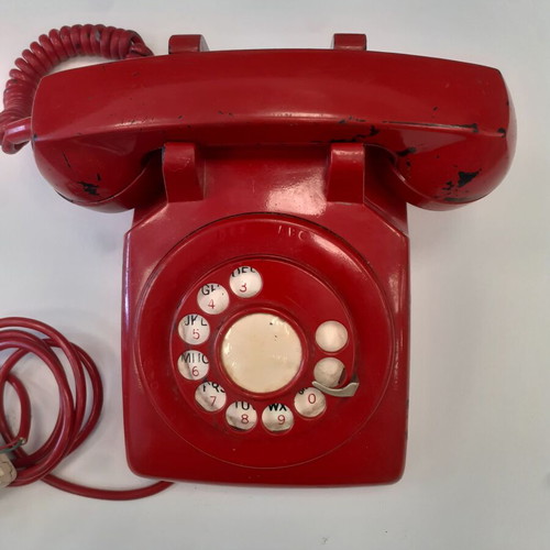 Western Electric red telephone used, 1960s-1970s