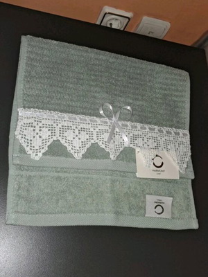 Hand towel new with handmade lace and ribbon bow