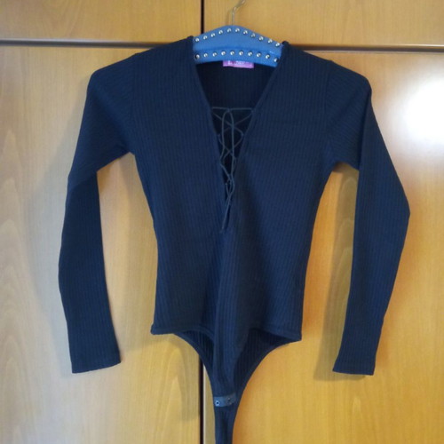 Black ribbed bodysuit used with deep lace-up neckline, size S