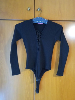 Black ribbed bodysuit used with deep lace-up neckline, size S