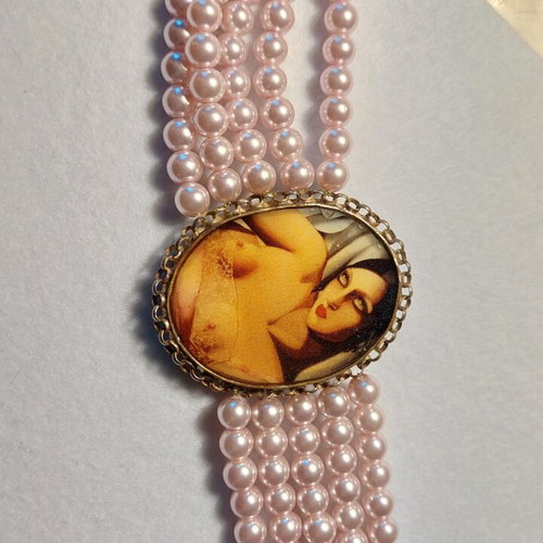 Handmade bracelet with bronze centerpiece and silver chain, new