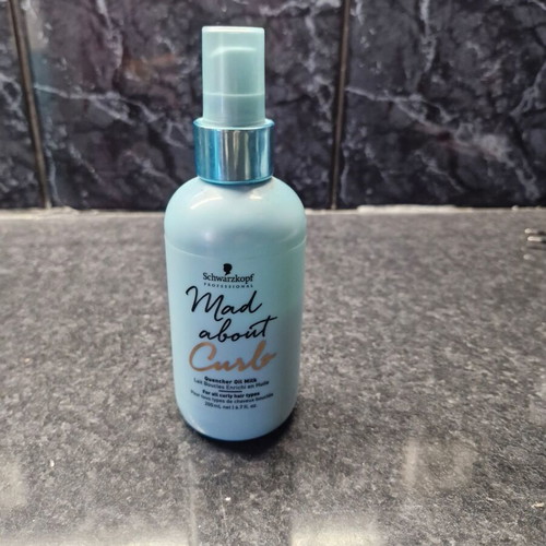 Mad About Curls hair spray used