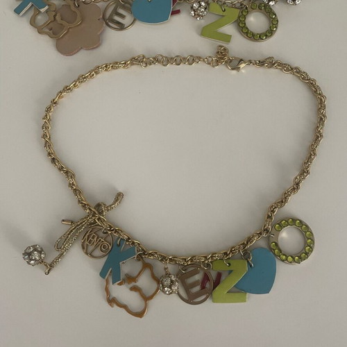 Kenzo necklace and bracelet set like new with unique charms