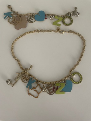 Kenzo necklace and bracelet set like new with unique charms