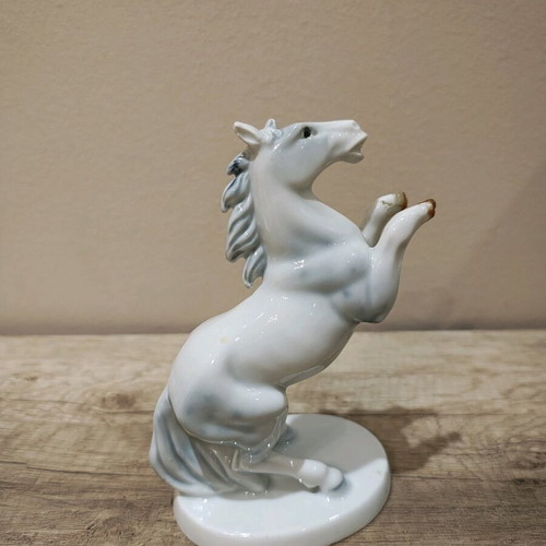 Porcelain horse figurine used, visible break