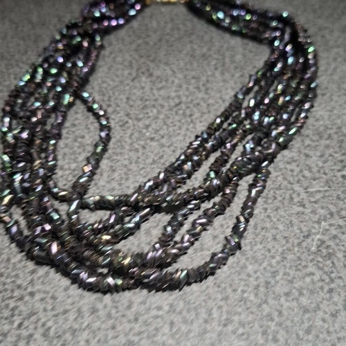 Torsade necklace used with iridescent carnival glass beads, 50cm