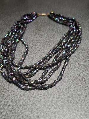 Torsade necklace used with iridescent carnival glass beads, 50cm