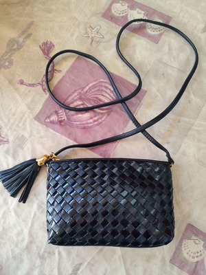 Vintage crossbody bag like new, black woven design with tassel