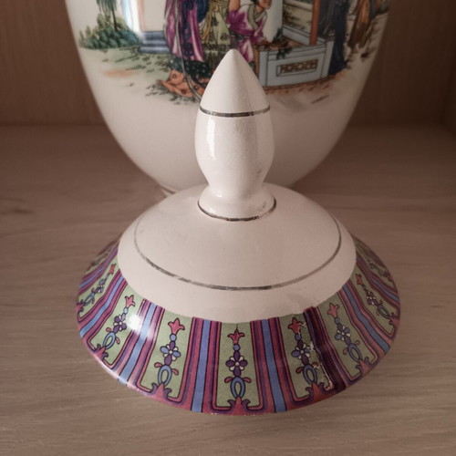 Collectible decorative porcelain vase with lid used