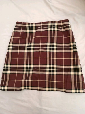 Checked skirt used, size M, quality fabric