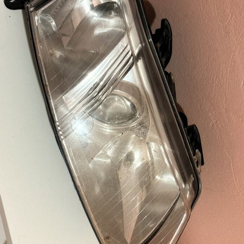 Saab 9-3 passenger side headlight used
