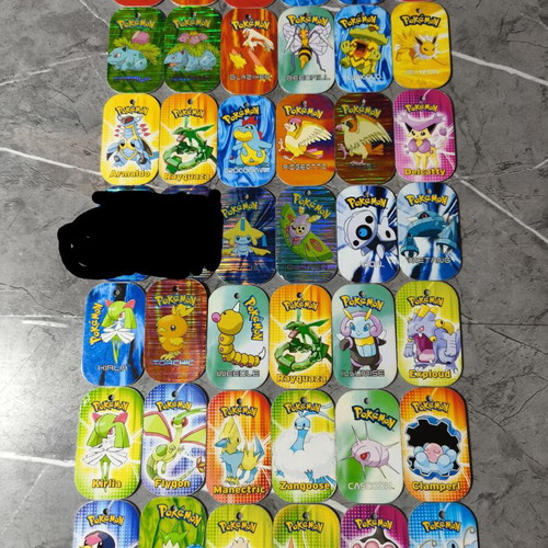 Pokemon metal collectible tokens pack of 40 used