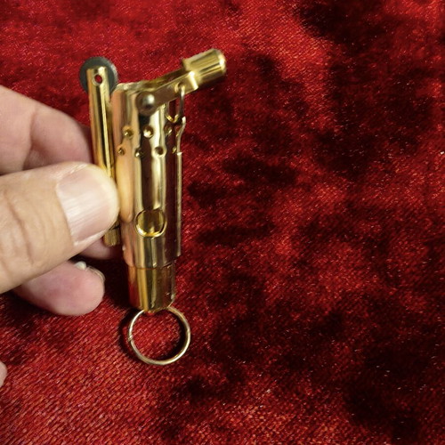 Vintage gold lighter stick-style, like new