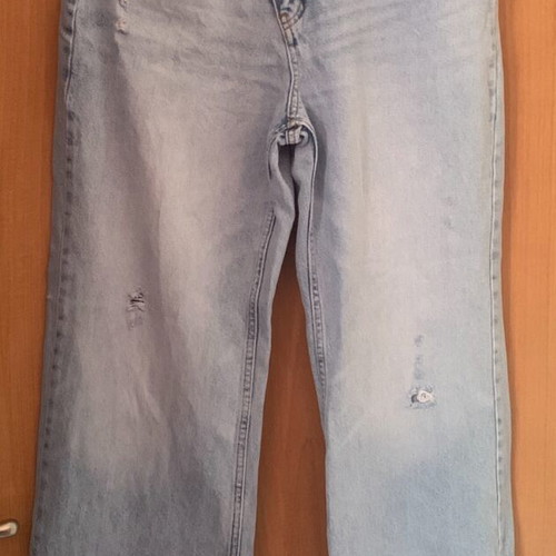 Jeans with asymmetrical buttoning like new, size M, blue