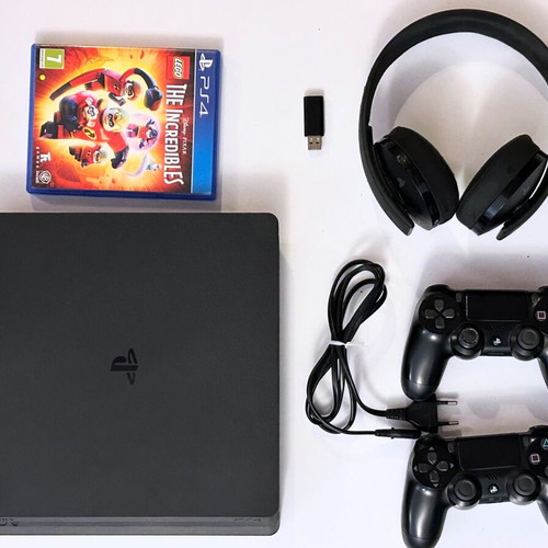 PlayStation 4 Slim 500GB like new with headset and 2 controllers