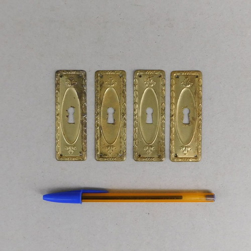 Decorative brass covers for furniture locks
