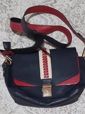 Accessorize bag like new