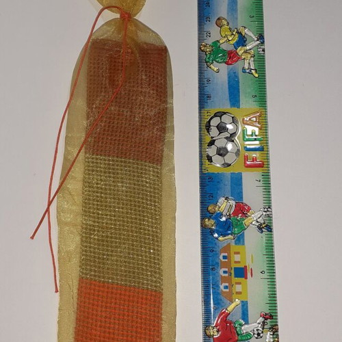 Handmade bookmark with dark orange, light gold and dark red colors