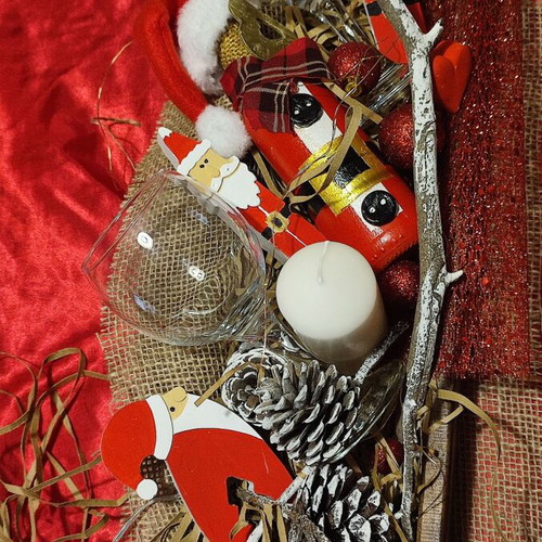 Christmas gift with wooden tray, wine bottle, glasses and decorations