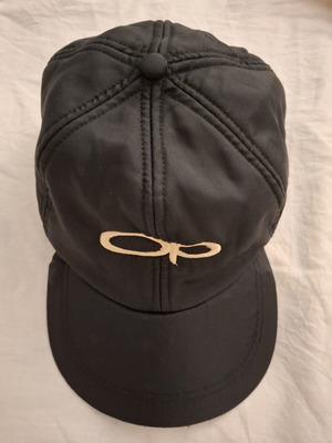 Jockey hat like new with ear protection, adjustable size, black and red