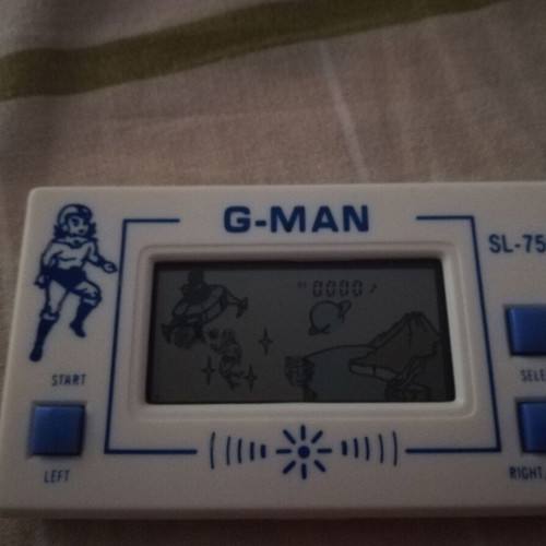 Pocketgame G-MAN SL-75G used electronic game with LCD screen