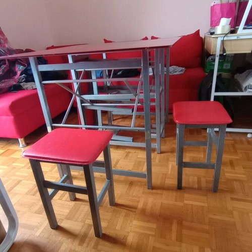 Folding table with 4 stools used, red color