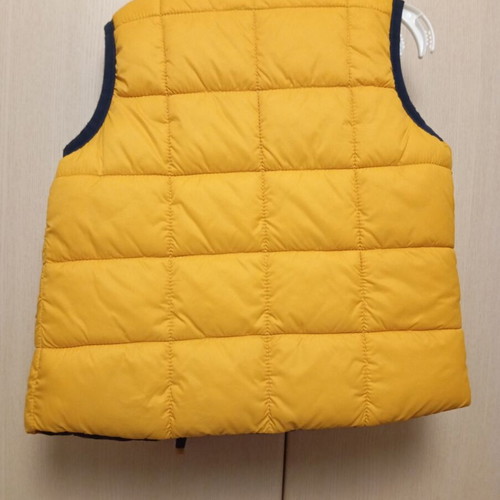Reversible sleeveless kids vest like new, blue and yellow