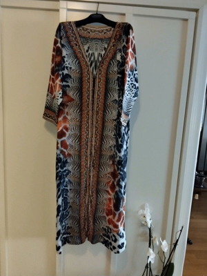 Caftan dress medium like new with unique pattern and color combinations