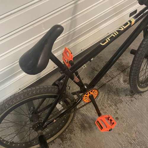 BMX bicycle like new, black, with extra metal pegs for tricks