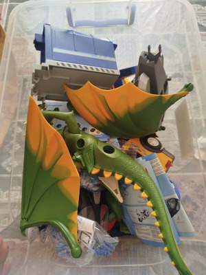 Playmobil box with helicopter, dragon, school bus, garbage truck and more