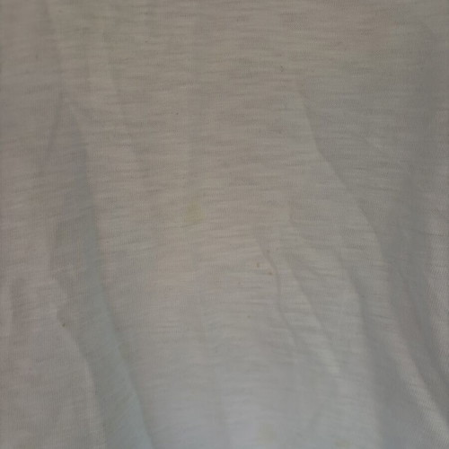 Two white polo shirts used, size XL, slight yellow stain on one