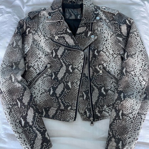 Please short leatherette jacket small like new, beige brown