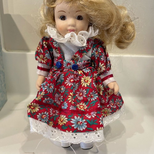 BC porcelain dolls like new, set of 2 pieces