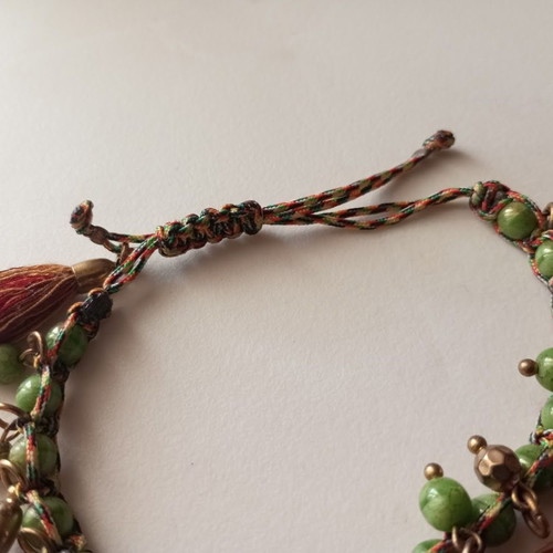 Bracelet new with green beads and red tassels boho style