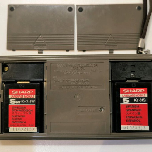 Sharp IQ-3100 electronic translator used with 2 modules and case