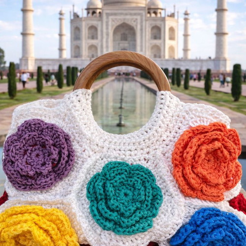 Handmade crocheted handbag with wooden handles and colorful flowers new