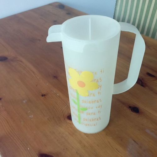 Plastic water jug with four glasses set used