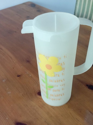 Plastic water jug with four glasses set used