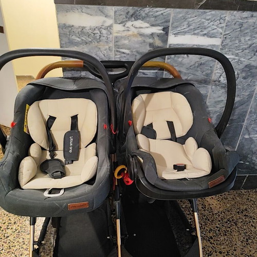 Chipolino twin stroller with baskets and car seat adapters used