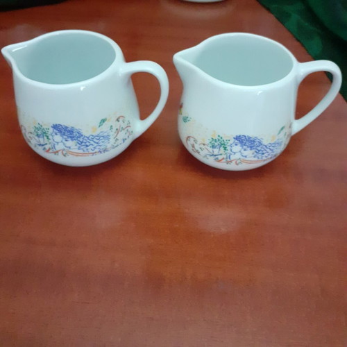 Porcelain milk jugs with Stathopoulos imprint, like new, set of 2