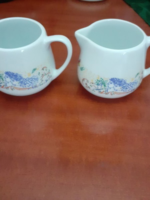 Porcelain milk jugs with Stathopoulos imprint, like new, set of 2