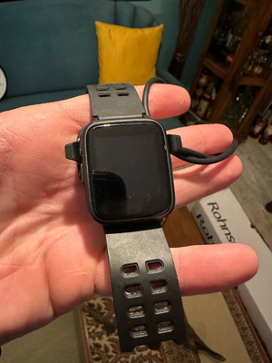 Turbo X smart watch used with charger, needs new strap