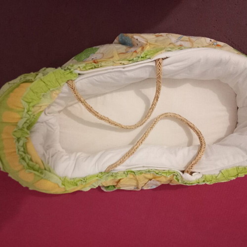 Bassinet used with mattress, mosquito net, and small quilt
