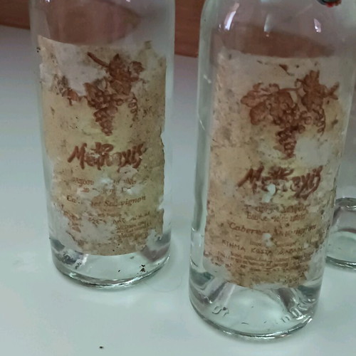 Methexis Distillate Cabernet Sauvignon pack with worn labels