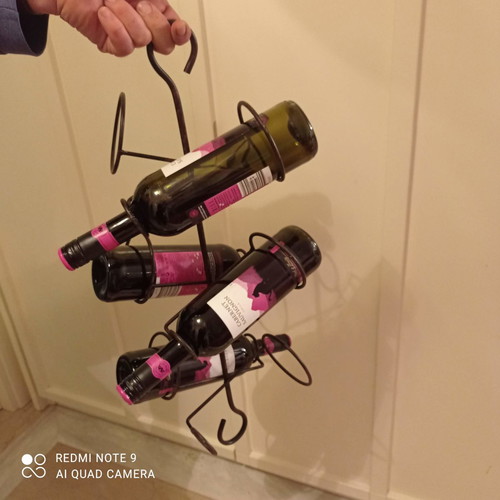 Hanging wine rack used, handmade iron