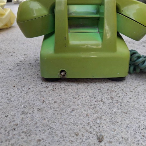 Vintage green rotary dial telephone used