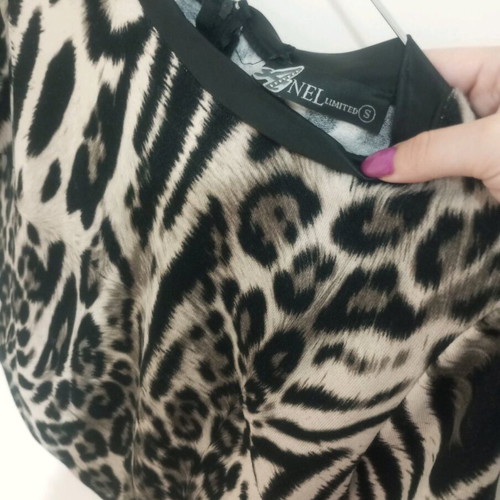 Women’s animal print top with black leather trim new, unworn